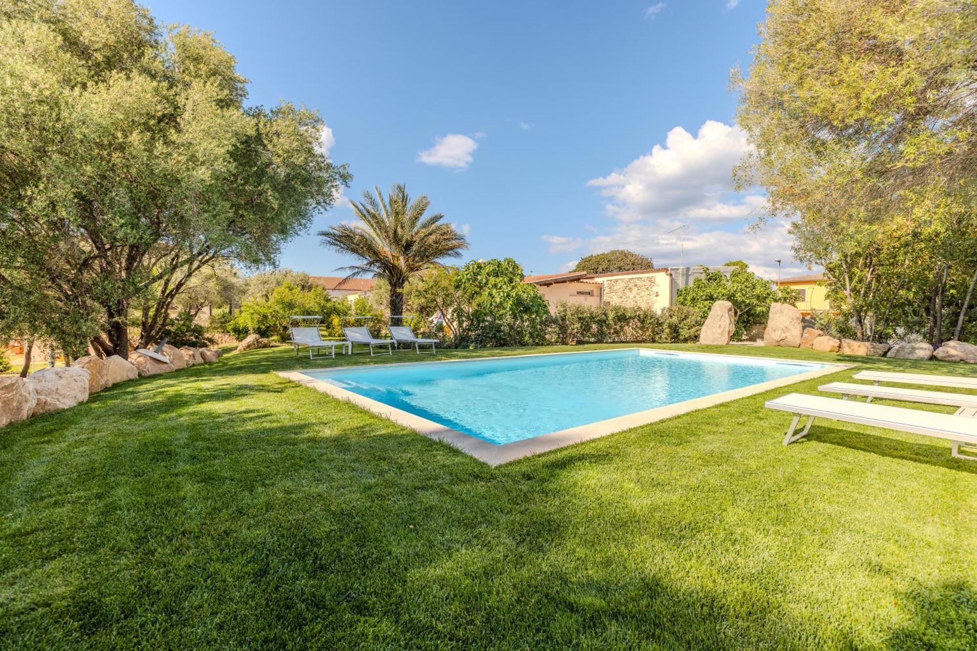 Stazzo San Teodoro Piscina Condivisa Apartment Exterior foto
