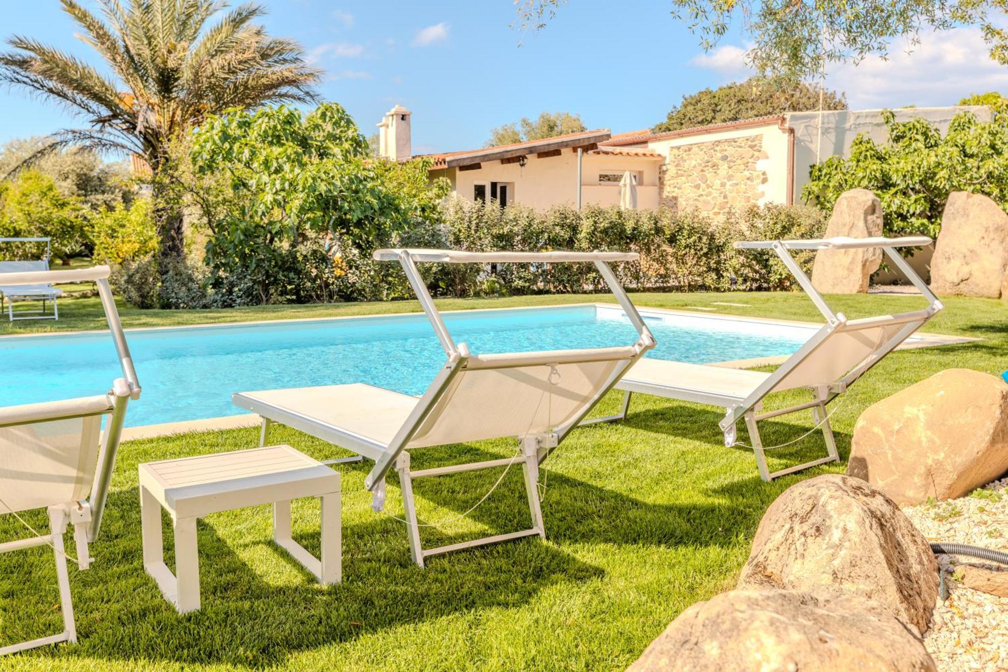 Stazzo San Teodoro Piscina Condivisa Apartment Exterior foto
